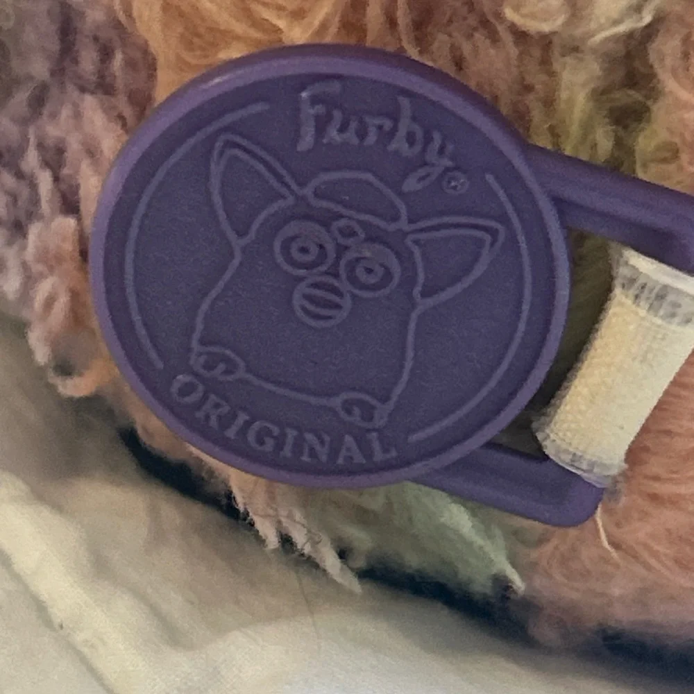 Colorful Plush Bird Toy with Purple Accents